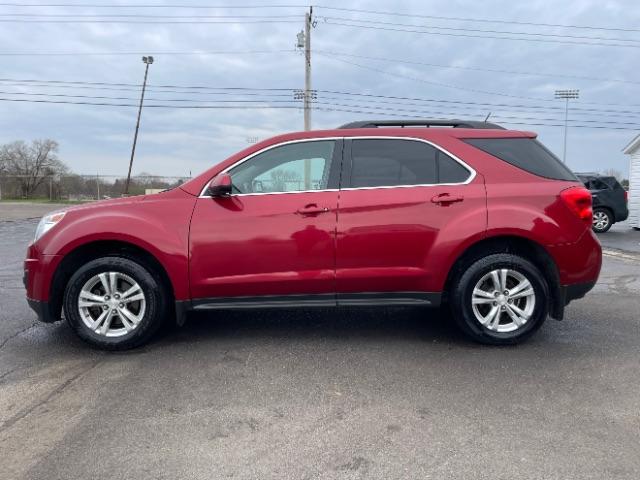 2015 Crystal Red Tintcoat Chevrolet Equinox 1LT AWD (2GNFLFEK3F6) with an 2.4L L4 DOHC 16V FFV engine, 6-Speed Automatic transmission, located at 880 E. National Road, Vandalia, OH, 45377, (937) 908-9800, 39.891918, -84.183594 - Photo #8
