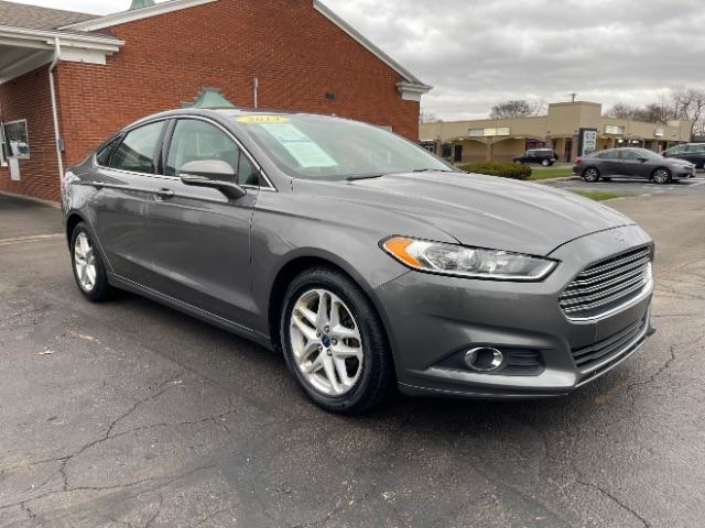 2014 Sterling Gray Ford Fusion SE (3FA6P0HD5ER) with an 1.5L L4 DOHC 16V engine, located at 1099 N County Rd 25A , Troy, OH, 45373, (937) 908-9800, 40.057079, -84.212883 - Photo #0