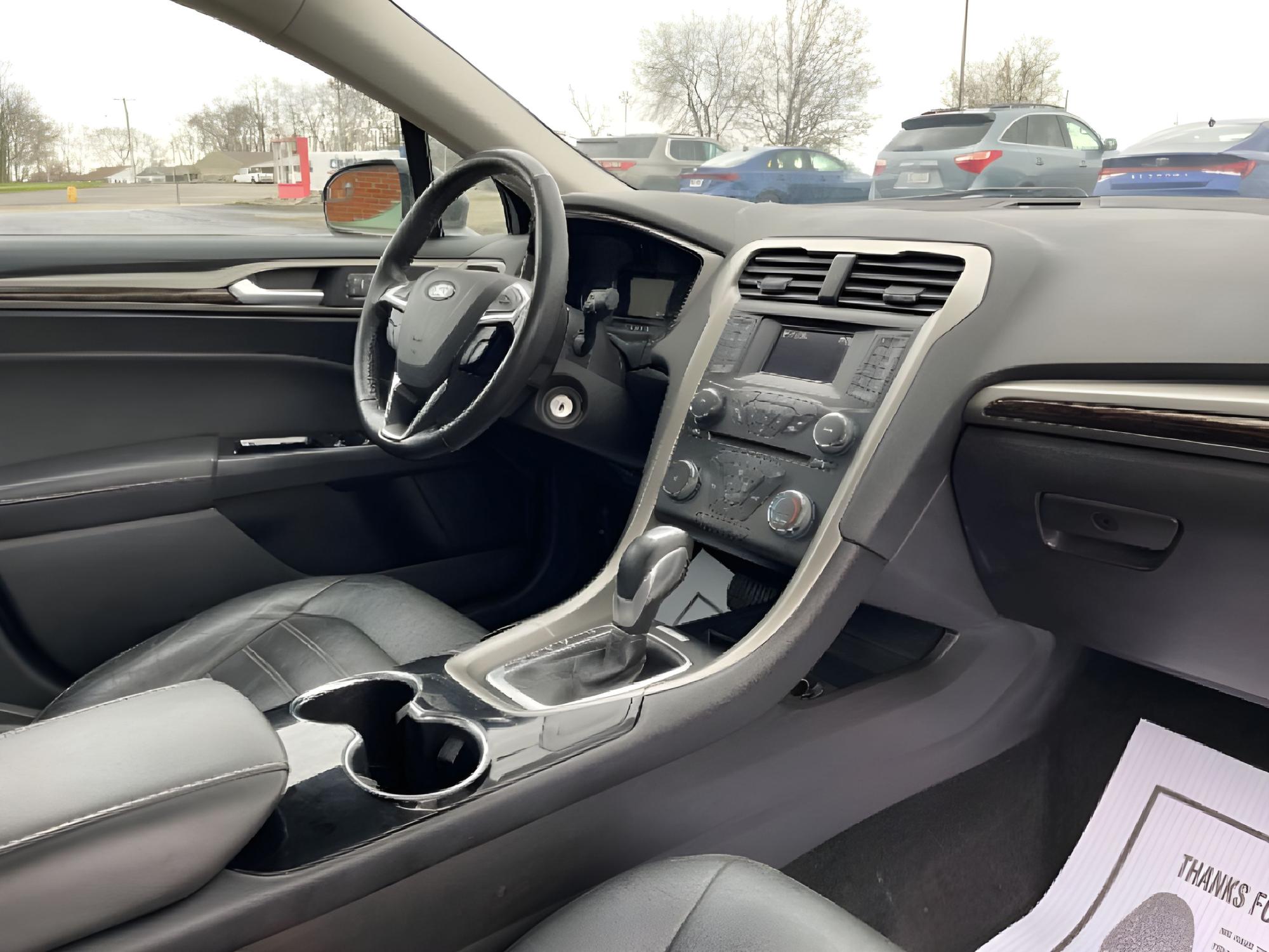 2014 Sterling Gray Ford Fusion SE (3FA6P0HD5ER) with an 1.5L L4 DOHC 16V engine, located at 1099 N County Rd 25A , Troy, OH, 45373, (937) 908-9800, 40.057079, -84.212883 - Photo #17