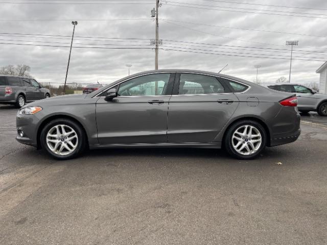 2014 Sterling Gray Ford Fusion SE (3FA6P0HD5ER) with an 1.5L L4 DOHC 16V engine, located at 1099 N County Rd 25A , Troy, OH, 45373, (937) 908-9800, 40.057079, -84.212883 - Photo #4