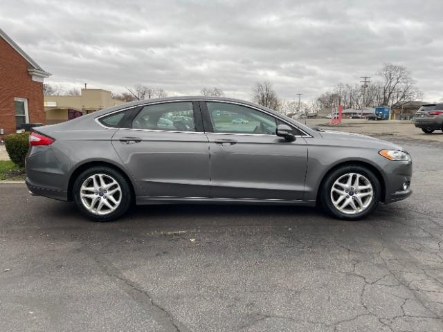 2014 Sterling Gray Ford Fusion SE (3FA6P0HD5ER) with an 1.5L L4 DOHC 16V engine, located at 1099 N County Rd 25A , Troy, OH, 45373, (937) 908-9800, 40.057079, -84.212883 - Photo #6