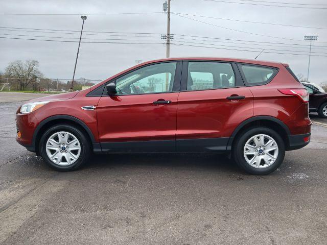 2016 Sunset Metallic Ford Escape S FWD (1FMCU0F79GU) with an 2.5L L4 DOHC 16V engine, 6-Speed Automatic transmission, located at 1951 S Dayton Lakeview Rd., New Carlisle, OH, 45344, (937) 908-9800, 39.890999, -84.050255 - Photo #6