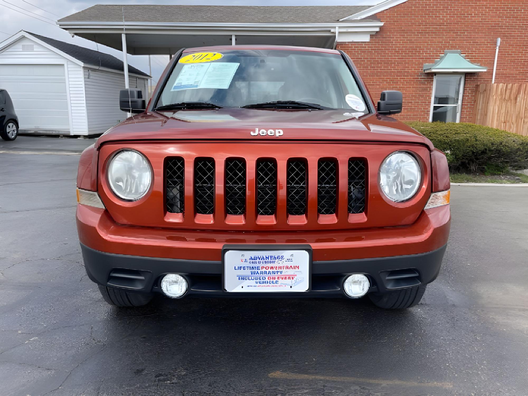 2012 Brown Jeep Patriot Latitude 4WD (1C4NJRFB2CD) with an 2.4L L4 DOHC 16V engine, located at 401 Woodman Dr, Riverside, OH, 45431, (937) 908-9800, 39.760899, -84.123421 - Photo #11