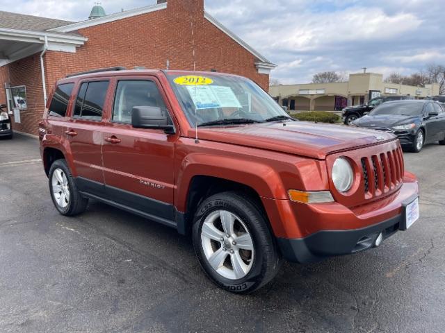 2012 Brown Jeep Patriot Latitude 4WD (1C4NJRFB2CD) with an 2.4L L4 DOHC 16V engine, located at 401 Woodman Dr, Riverside, OH, 45431, (937) 908-9800, 39.760899, -84.123421 - Photo #0