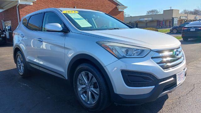 2014 Moonstone Silver Hyundai Santa Fe Sport 2.4 FWD (5XYZT3LB5EG) with an 2.4L L4 DOHC 16V engine, 6-Speed Automatic transmission, located at 401 Woodman Dr, Riverside, OH, 45431, (937) 908-9800, 39.760899, -84.123421 - Photo #0