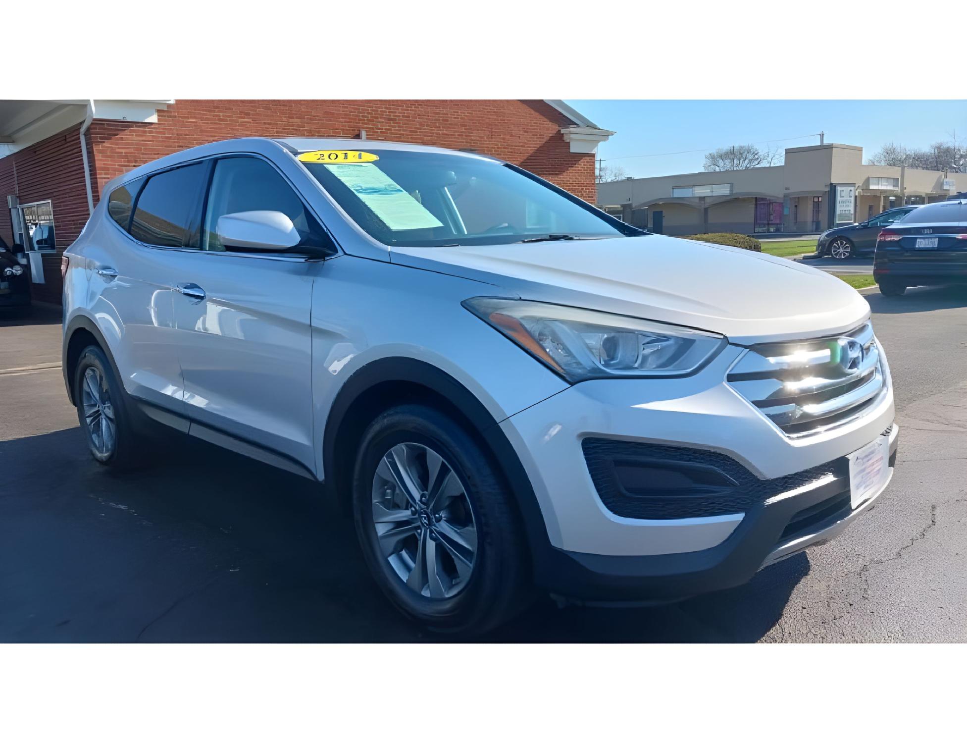 2014 Moonstone Silver Hyundai Santa Fe Sport 2.4 FWD (5XYZT3LB5EG) with an 2.4L L4 DOHC 16V engine, 6-Speed Automatic transmission, located at 401 Woodman Dr, Riverside, OH, 45431, (937) 908-9800, 39.760899, -84.123421 - Photo #11