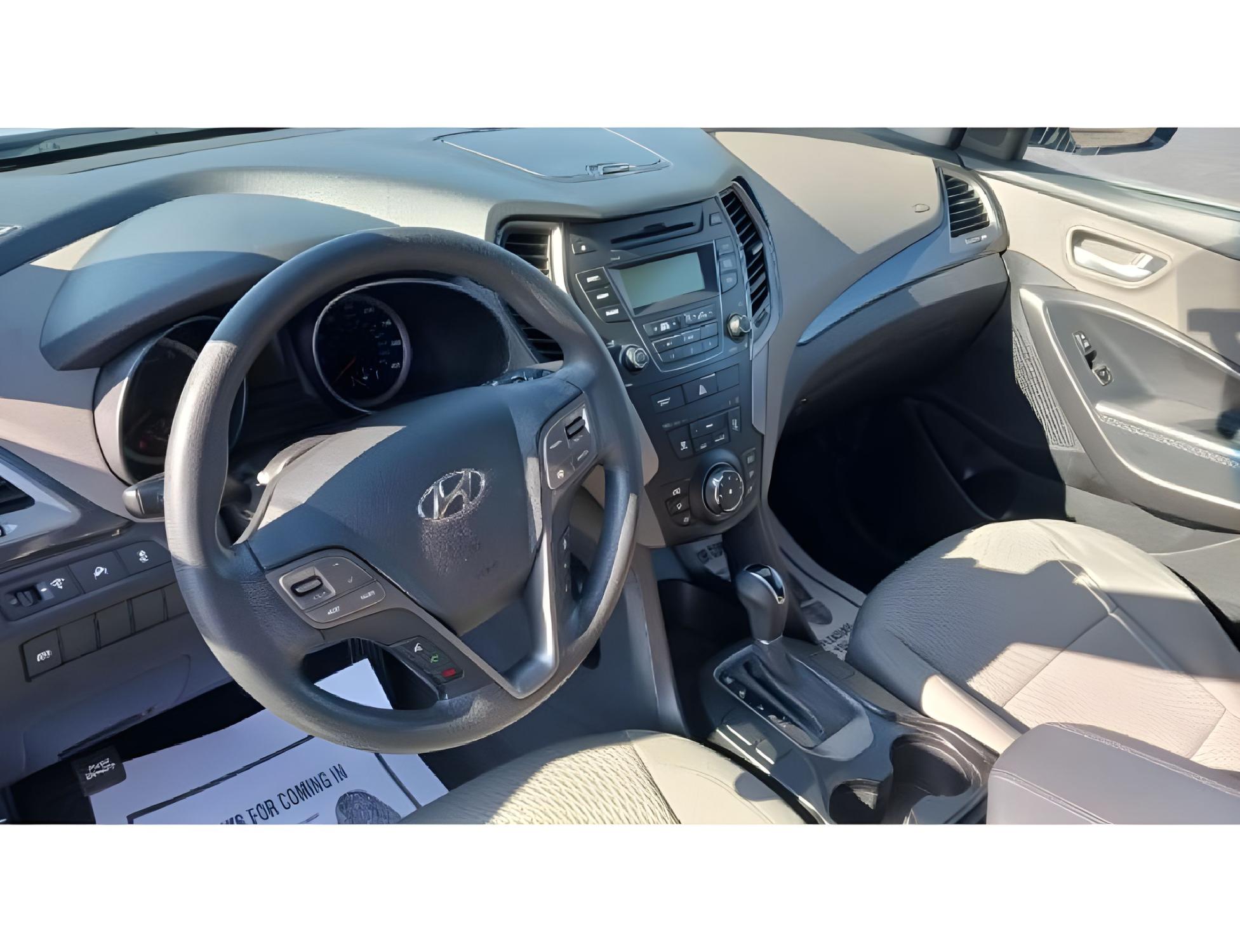 2014 Moonstone Silver Hyundai Santa Fe Sport 2.4 FWD (5XYZT3LB5EG) with an 2.4L L4 DOHC 16V engine, 6-Speed Automatic transmission, located at 401 Woodman Dr, Riverside, OH, 45431, (937) 908-9800, 39.760899, -84.123421 - Photo #13
