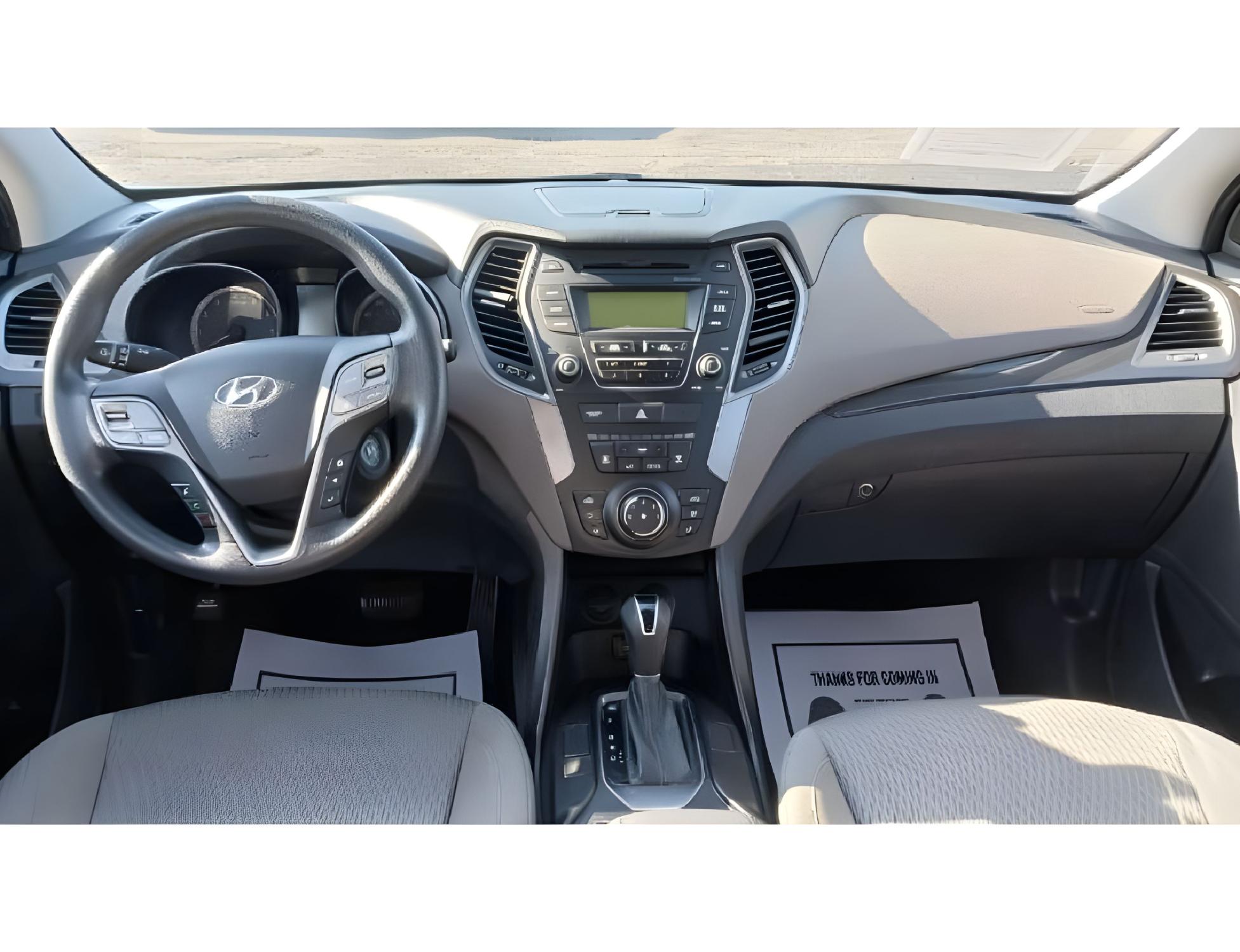 2014 Moonstone Silver Hyundai Santa Fe Sport 2.4 FWD (5XYZT3LB5EG) with an 2.4L L4 DOHC 16V engine, 6-Speed Automatic transmission, located at 401 Woodman Dr, Riverside, OH, 45431, (937) 908-9800, 39.760899, -84.123421 - Photo #15
