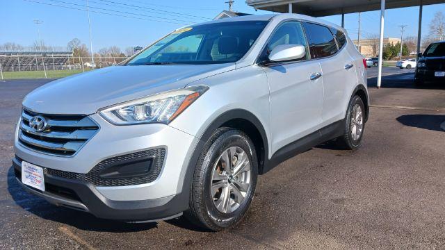 2014 Moonstone Silver Hyundai Santa Fe Sport 2.4 FWD (5XYZT3LB5EG) with an 2.4L L4 DOHC 16V engine, 6-Speed Automatic transmission, located at 401 Woodman Dr, Riverside, OH, 45431, (937) 908-9800, 39.760899, -84.123421 - Photo #4