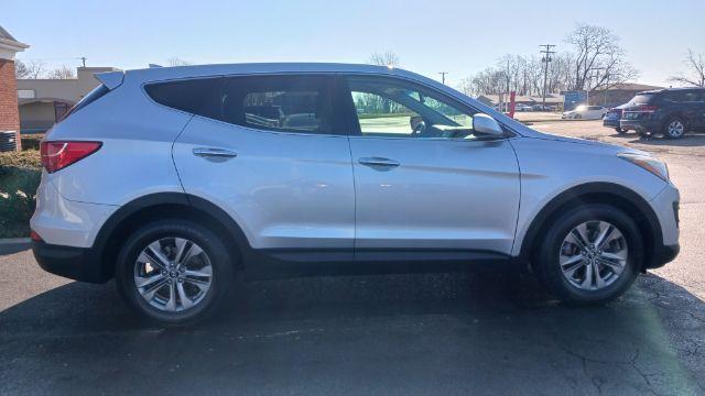 2014 Moonstone Silver Hyundai Santa Fe Sport 2.4 FWD (5XYZT3LB5EG) with an 2.4L L4 DOHC 16V engine, 6-Speed Automatic transmission, located at 401 Woodman Dr, Riverside, OH, 45431, (937) 908-9800, 39.760899, -84.123421 - Photo #8