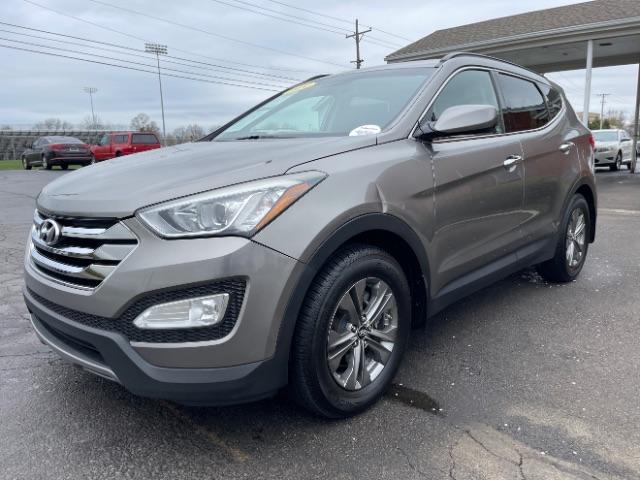 2014 Mineral Gray Hyundai Santa Fe Sport 2.4 FWD (5XYZU3LB3EG) with an 2.4L L4 DOHC 16V engine, 6-Speed Automatic transmission, located at 1099 N County Rd 25A , Troy, OH, 45373, (937) 908-9800, 40.057079, -84.212883 - Photo #2