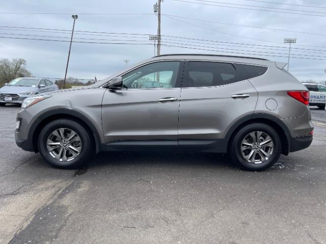 2014 Mineral Gray Hyundai Santa Fe Sport 2.4 FWD (5XYZU3LB3EG) with an 2.4L L4 DOHC 16V engine, 6-Speed Automatic transmission, located at 1184 Kauffman Ave, Fairborn, OH, 45324, (937) 908-9800, 39.807072, -84.030914 - Photo #4