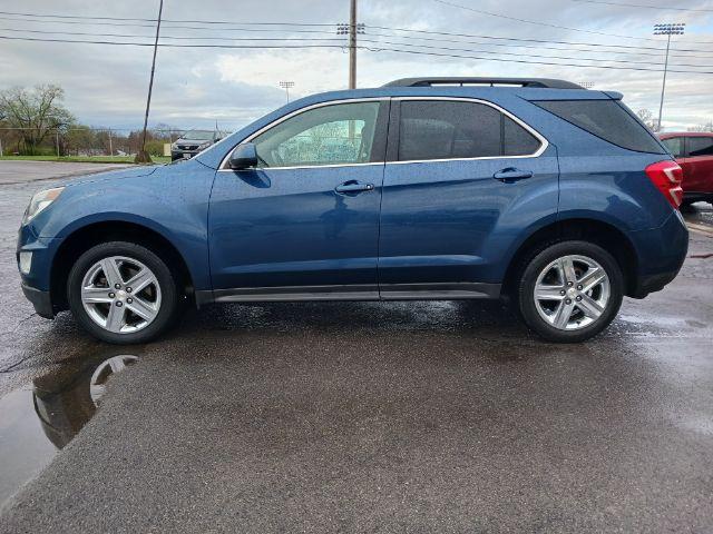 2016 Patriot Blue Metallic Chevrolet Equinox LT 2WD (2GNALCEK3G6) with an 2.4L L4 DOHC 16V FFV engine, 6-Speed Automatic transmission, located at 1099 N County Rd 25A , Troy, OH, 45373, (937) 908-9800, 40.057079, -84.212883 - Photo #6