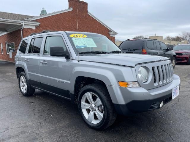 2014 Bright Silver Metallic CC Jeep Patriot Latitude 4WD (1C4NJRFB2ED) with an 2.4L L4 DOHC 16V engine, located at 1184 Kauffman Ave, Fairborn, OH, 45324, (937) 908-9800, 39.807072, -84.030914 - Photo #0