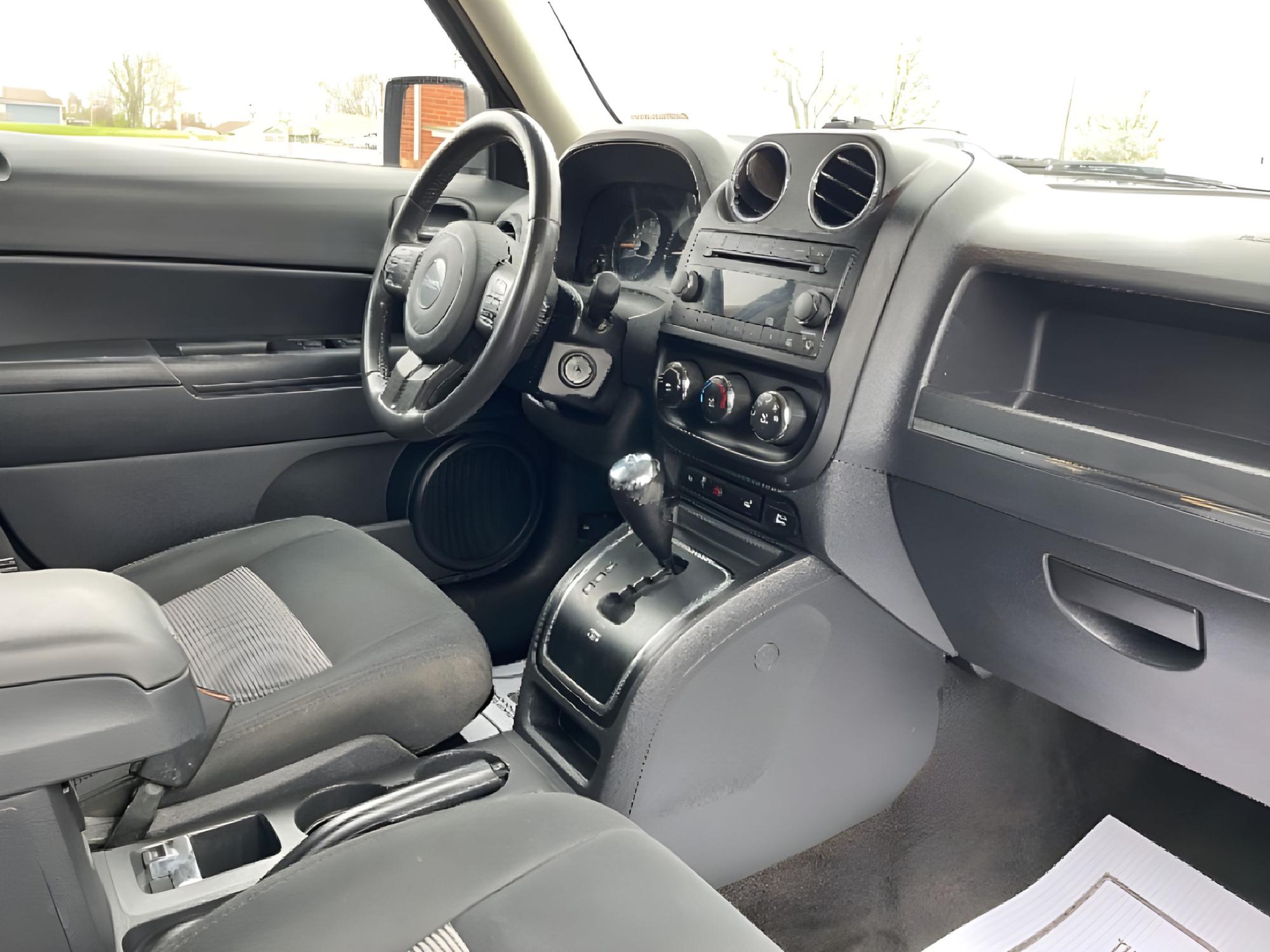 2014 Bright Silver Metallic CC Jeep Patriot Latitude 4WD (1C4NJRFB2ED) with an 2.4L L4 DOHC 16V engine, located at 1184 Kauffman Ave, Fairborn, OH, 45324, (937) 908-9800, 39.807072, -84.030914 - Photo #15