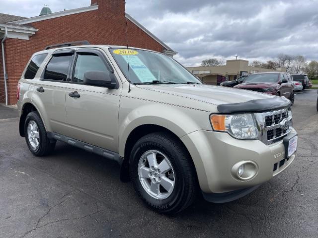 2010 Gold Leaf Metallic Ford Escape XLS FWD (1FMCU0C74AK) with an 2.5L L4 DOHC 16V engine, located at 1184 Kauffman Ave, Fairborn, OH, 45324, (937) 908-9800, 39.807072, -84.030914 - Photo #0