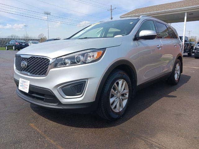 2017 Sparkling Silver Kia Sorento LX 2WD (5XYPG4A37HG) with an 2.4L L4 DOHC 16V engine, 6-Speed Automatic transmission, located at 401 Woodman Dr, Riverside, OH, 45431, (937) 908-9800, 39.760899, -84.123421 - Photo #2