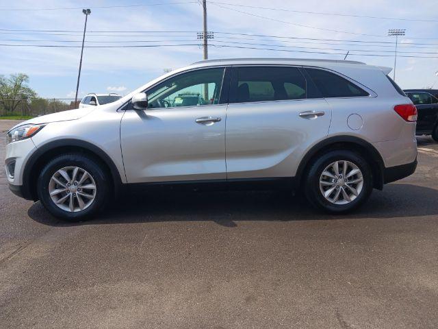 2017 Sparkling Silver Kia Sorento LX 2WD (5XYPG4A37HG) with an 2.4L L4 DOHC 16V engine, 6-Speed Automatic transmission, located at 401 Woodman Dr, Riverside, OH, 45431, (937) 908-9800, 39.760899, -84.123421 - Photo #4