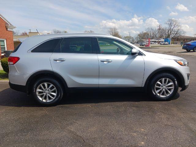 2017 Sparkling Silver Kia Sorento LX 2WD (5XYPG4A37HG) with an 2.4L L4 DOHC 16V engine, 6-Speed Automatic transmission, located at 401 Woodman Dr, Riverside, OH, 45431, (937) 908-9800, 39.760899, -84.123421 - Photo #6
