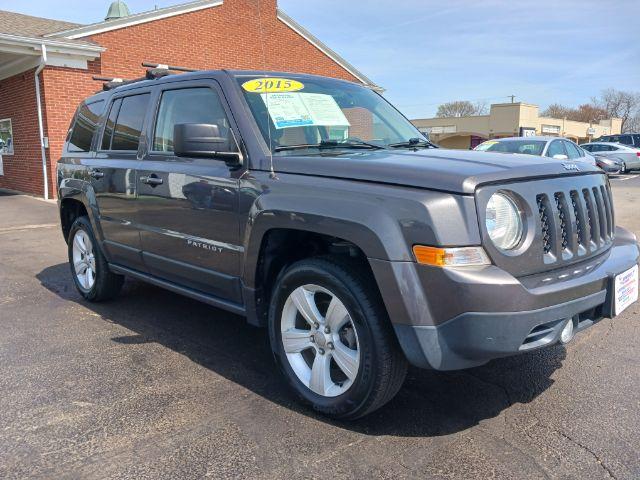 2015 Granite Crystal Met CC Jeep Patriot Latitude 4WD (1C4NJRFB8FD) with an 2.4L L4 DOHC 16V engine, located at 1951 S Dayton Lakeview Rd., New Carlisle, OH, 45344, (937) 908-9800, 39.890999, -84.050255 - Photo #0