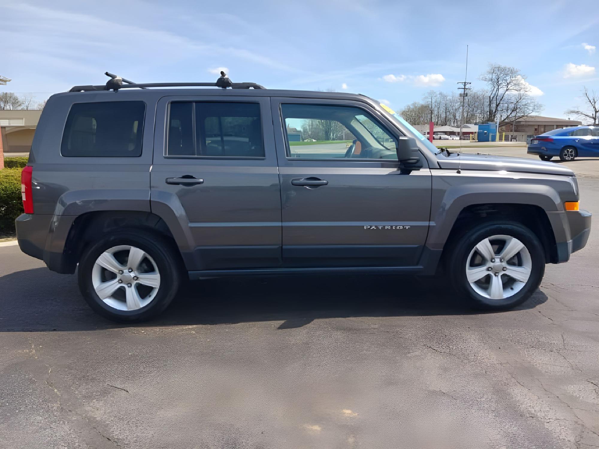 2015 Granite Crystal Met CC Jeep Patriot Latitude 4WD (1C4NJRFB8FD) with an 2.4L L4 DOHC 16V engine, located at 1951 S Dayton Lakeview Rd., New Carlisle, OH, 45344, (937) 908-9800, 39.890999, -84.050255 - Photo #11