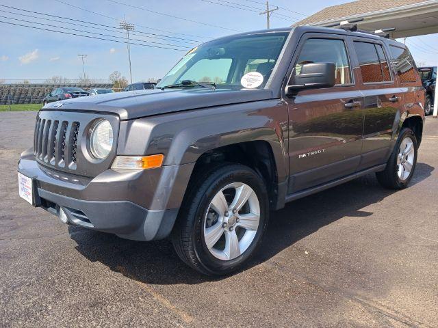 2015 Granite Crystal Met CC Jeep Patriot Latitude 4WD (1C4NJRFB8FD) with an 2.4L L4 DOHC 16V engine, located at 1951 S Dayton Lakeview Rd., New Carlisle, OH, 45344, (937) 908-9800, 39.890999, -84.050255 - Photo #2