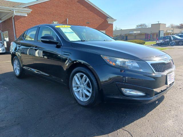 2013 Ebony Black Kia Optima LX AT (5XXGM4A7XDG) with an 2.4L L4 DOHC 16V engine, 6-Speed Automatic transmission, located at 1230 East Main St, Xenia, OH, 45385, (937) 908-9800, 39.688026, -83.910172 - Photo #0