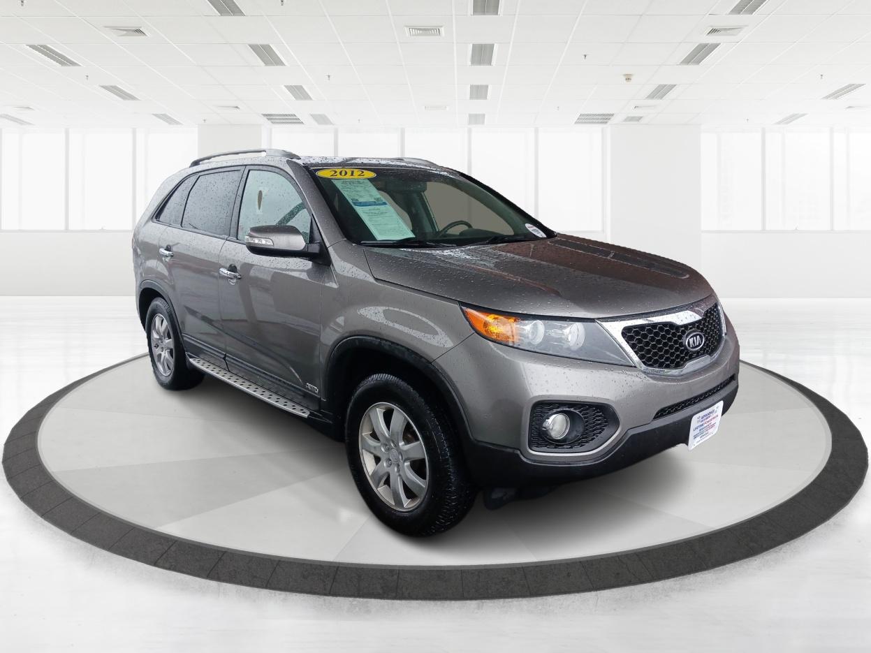 2012 Titanium Silver Kia Sorento LX 4WD (5XYKTCA63CG) with an 2.4L L4 DOHC 16V engine, 6-Speed Automatic transmission, located at 4508 South Dixie Dr, Moraine, OH, 45439, (937) 908-9800, 39.689976, -84.218452 - Photo #0