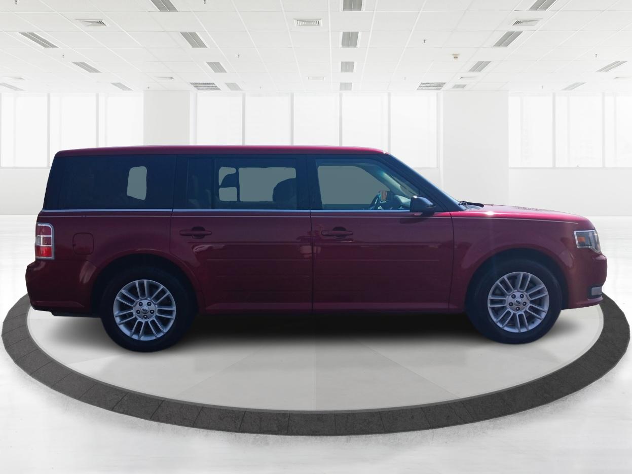 2014 Ruby Red Met Tinted CC Ford Flex SEL FWD (2FMGK5C89EB) with an 3.5L V6 DOHC 24V engine, 6-Speed Automatic Overdrive transmission, located at 880 E. National Road, Vandalia, OH, 45377, (937) 908-9800, 39.891918, -84.183594 - Photo #1