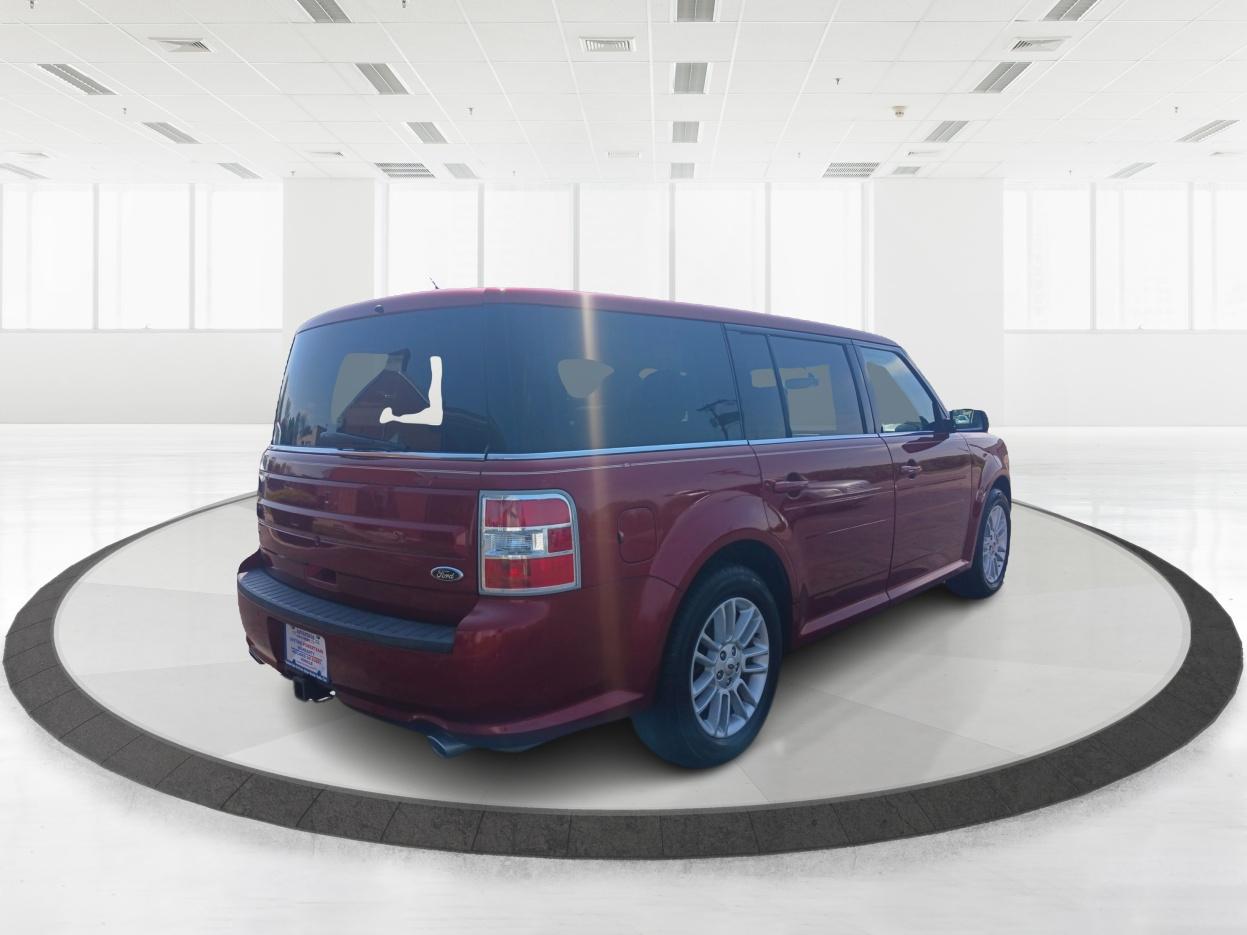 2014 Ruby Red Met Tinted CC Ford Flex SEL FWD (2FMGK5C89EB) with an 3.5L V6 DOHC 24V engine, 6-Speed Automatic Overdrive transmission, located at 880 E. National Road, Vandalia, OH, 45377, (937) 908-9800, 39.891918, -84.183594 - Photo #2