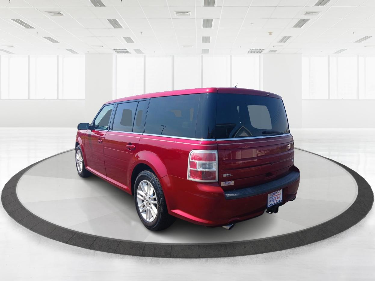 2014 Ruby Red Met Tinted CC Ford Flex SEL FWD (2FMGK5C89EB) with an 3.5L V6 DOHC 24V engine, 6-Speed Automatic Overdrive transmission, located at 880 E. National Road, Vandalia, OH, 45377, (937) 908-9800, 39.891918, -84.183594 - Photo #4