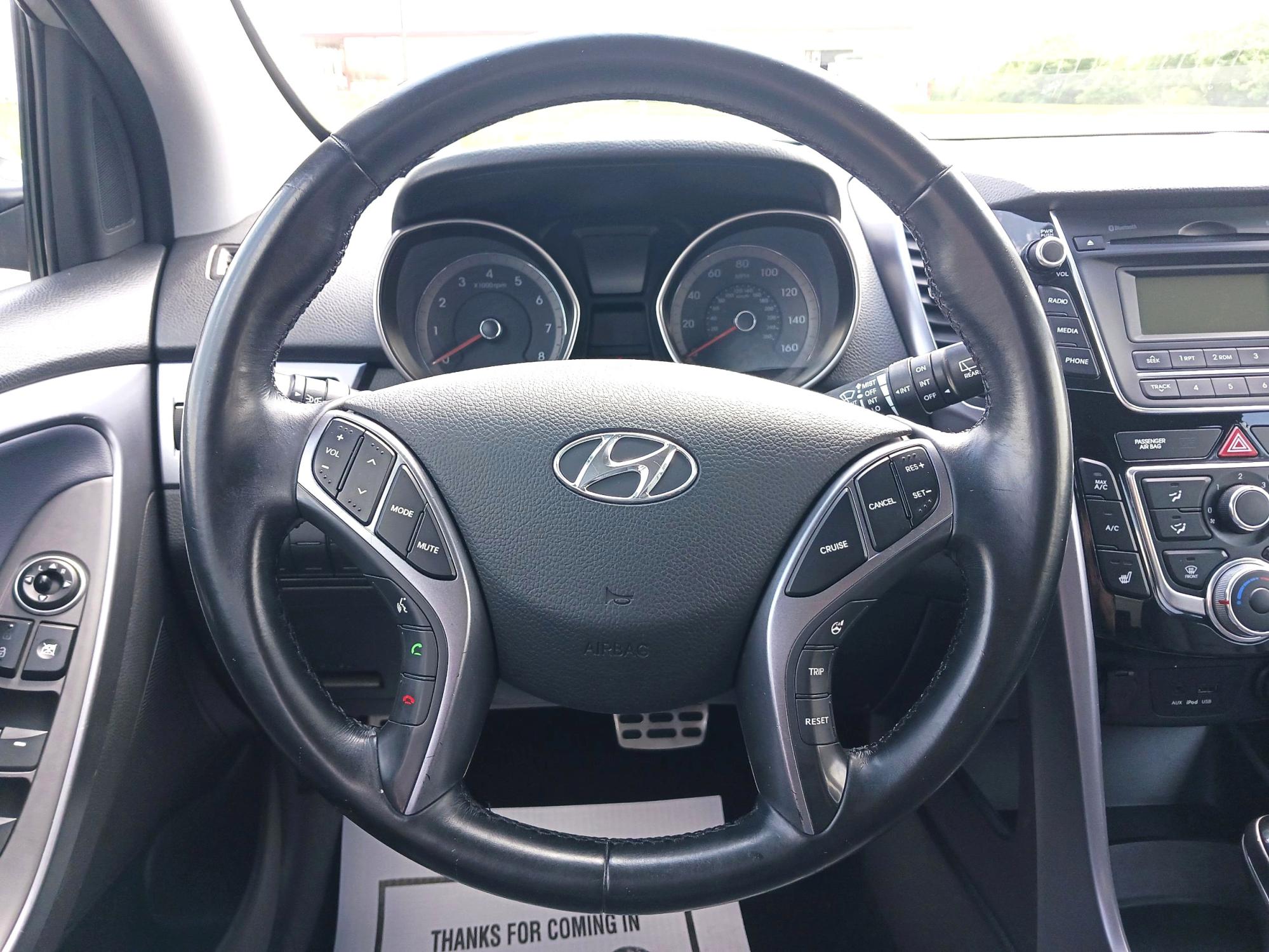 2014 Shimmering Silver Hyundai Elantra GT A/T (KMHD35LH0EU) with an 2.0L L4 16V DOHC engine, 6-Speed Automatic transmission, located at 4508 South Dixie Dr, Moraine, OH, 45439, (937) 908-9800, 39.689976, -84.218452 - Photo #15