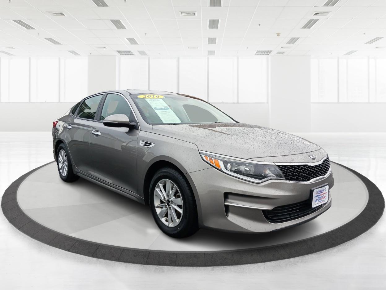 2016 Moss Grey Kia Optima LX (5XXGT4L34GG) with an 2.4L L4 DOHC 16V engine, 6-Speed Automatic transmission, located at 880 E. National Road, Vandalia, OH, 45377, (937) 908-9800, 39.891918, -84.183594 - Photo #0