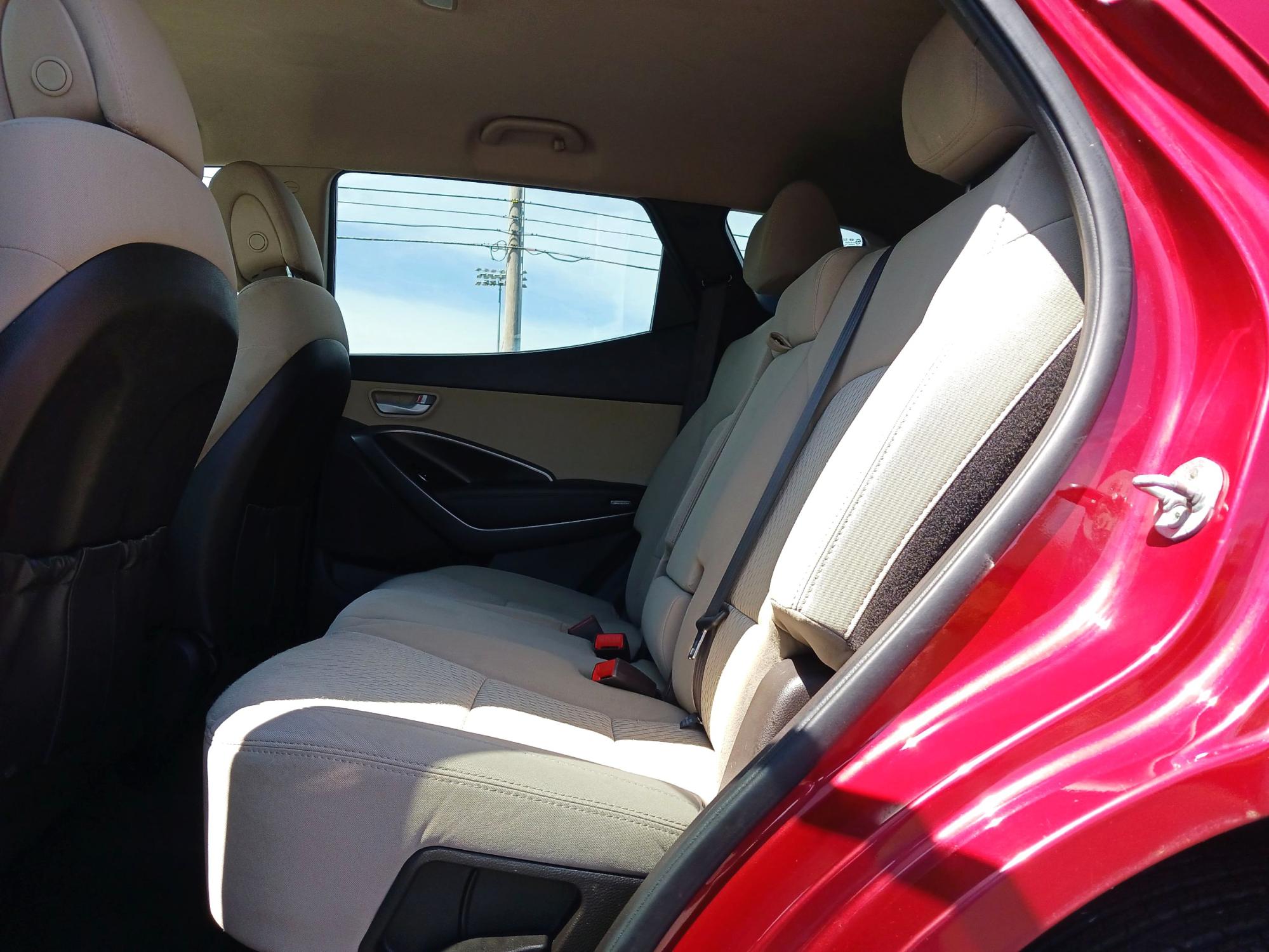 2014 Serrano Red Hyundai Santa Fe Sport 2.4 AWD (5XYZUDLB1EG) with an 2.4L L4 DOHC 16V engine, 6-Speed Automatic transmission, located at 880 E. National Road, Vandalia, OH, 45377, (937) 908-9800, 39.891918, -84.183594 - Photo #9