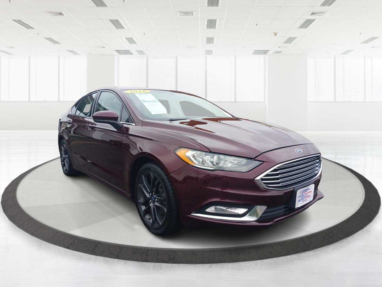 2018 Burgundy Velvet Metallic Tinted Clearcoat Ford Fusion SE (3FA6P0HD1JR) with an 1.5L L4 DOHC 16V engine, 6-Speed Automatic transmission, located at 1099 N County Rd 25A , Troy, OH, 45373, (937) 908-9800, 40.057079, -84.212883 - Photo #0