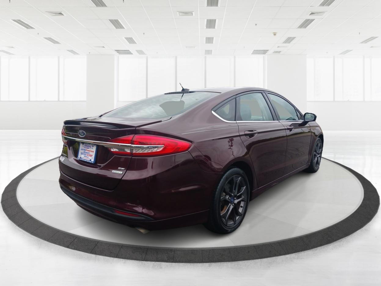 2018 Burgundy Velvet Metallic Tinted Clearcoat Ford Fusion SE (3FA6P0HD1JR) with an 1.5L L4 DOHC 16V engine, 6-Speed Automatic transmission, located at 1099 N County Rd 25A , Troy, OH, 45373, (937) 908-9800, 40.057079, -84.212883 - Photo #2