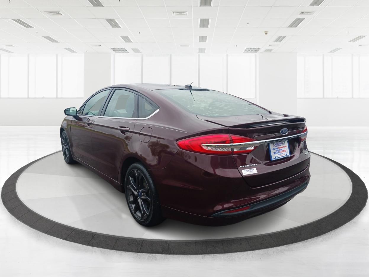 2018 Burgundy Velvet Metallic Tinted Clearcoat Ford Fusion SE (3FA6P0HD1JR) with an 1.5L L4 DOHC 16V engine, 6-Speed Automatic transmission, located at 1099 N County Rd 25A , Troy, OH, 45373, (937) 908-9800, 40.057079, -84.212883 - Photo #4