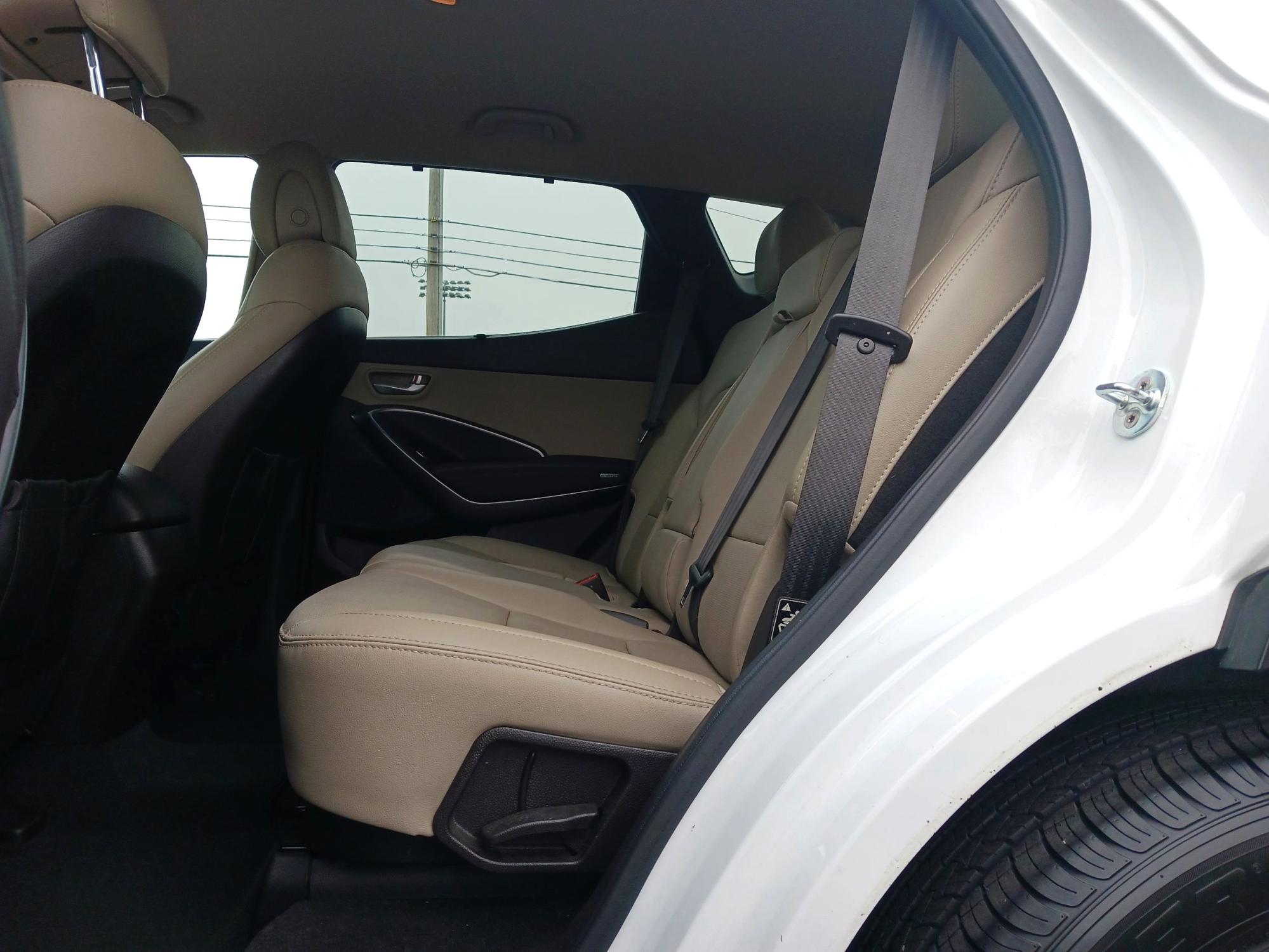 2017 Frost White Pearl Hyundai Santa Fe Sport 2.4 FWD (5XYZU3LB3HG) with an 2.4L L4 DOHC 16V engine, 6-Speed Automatic transmission, located at 880 E. National Road, Vandalia, OH, 45377, (937) 908-9800, 39.891918, -84.183594 - Photo #9