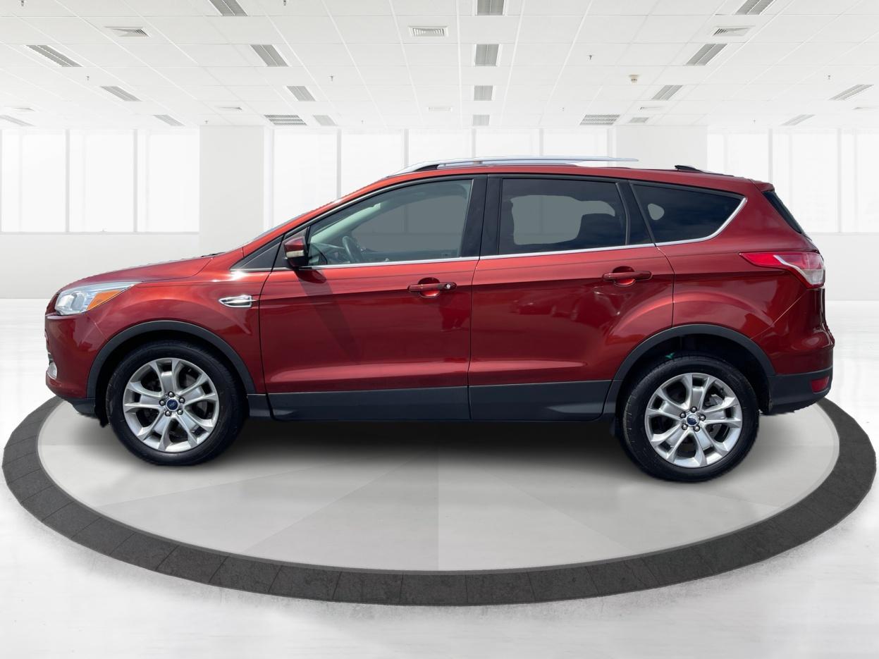2014 Ruby Red Tinted CC Ford Escape Titanium FWD (1FMCU0J96EU) with an 2.0L L4 DOHC 16V engine, 6-Speed Automatic transmission, located at 401 Woodman Dr, Riverside, OH, 45431, (937) 908-9800, 39.760899, -84.123421 - Photo #5