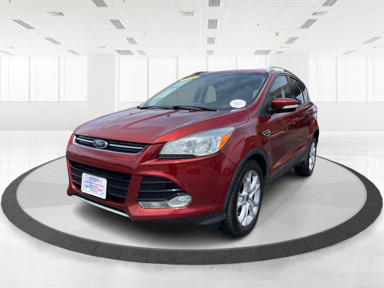2014 Ruby Red Tinted CC Ford Escape Titanium FWD (1FMCU0J96EU) with an 2.0L L4 DOHC 16V engine, 6-Speed Automatic transmission, located at 401 Woodman Dr, Riverside, OH, 45431, (937) 908-9800, 39.760899, -84.123421 - Photo #7