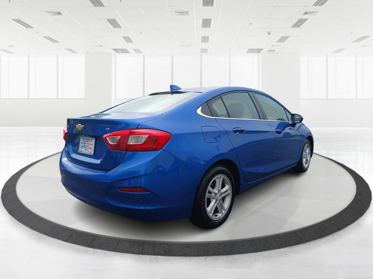 2017 Kinetic Blue Metallic Chevrolet Cruze LT Auto (1G1BE5SM3H7) with an 1.4L L4 DOHC 16V TURBO engine, 6-Speed Automatic transmission, located at 4508 South Dixie Dr, Moraine, OH, 45439, (937) 908-9800, 39.689976, -84.218452 - Photo #2