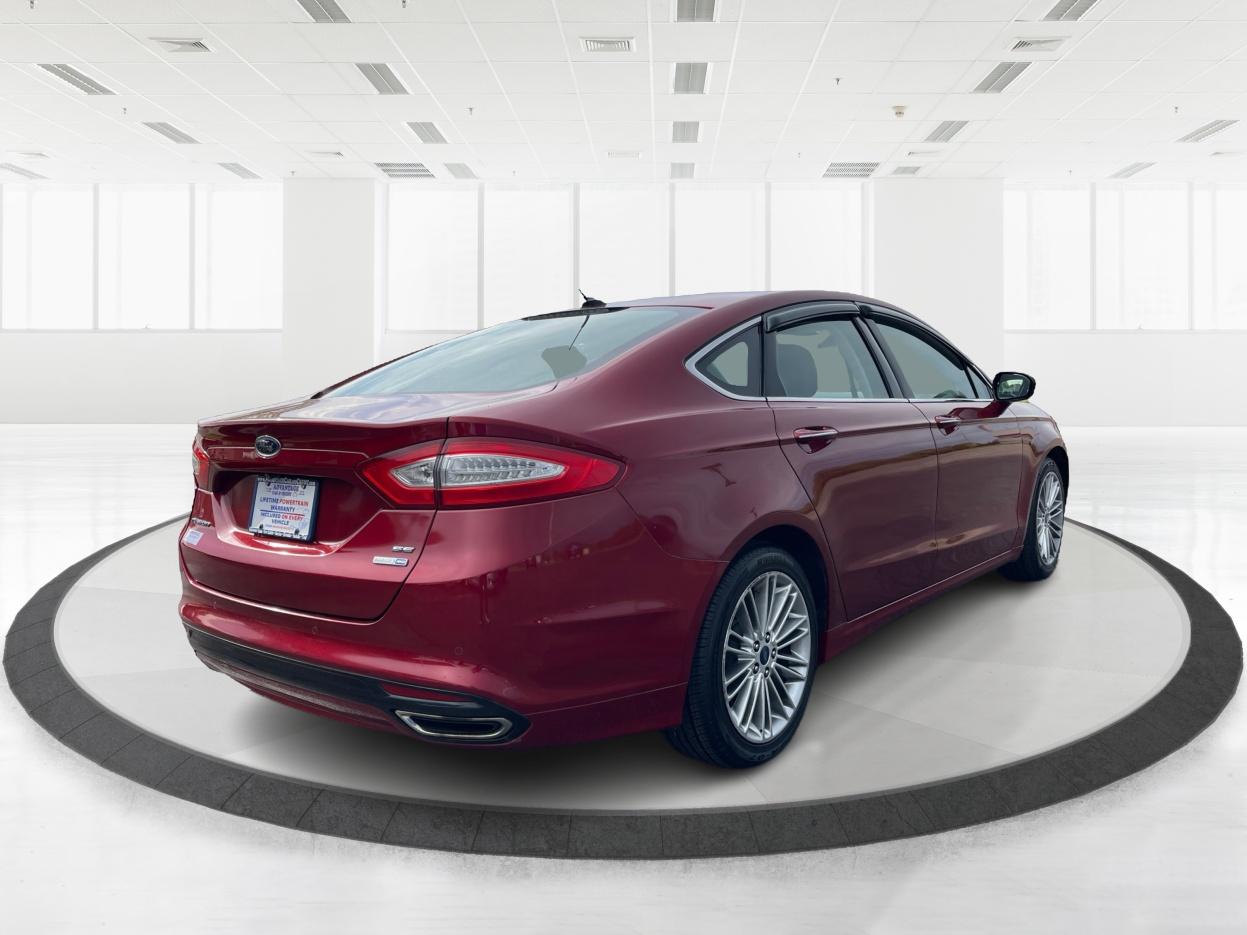 2015 Ruby Red Tinted CC Ford Fusion SE AWD (3FA6P0T96FR) with an 2.0L L4 DOHC 16V engine, 6-Speed Automatic transmission, located at 1951 S Dayton Lakeview Rd., New Carlisle, OH, 45344, (937) 908-9800, 39.890999, -84.050255 - Photo #2