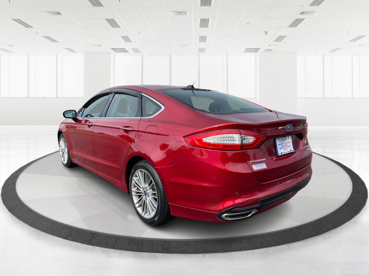 2015 Ruby Red Tinted CC Ford Fusion SE AWD (3FA6P0T96FR) with an 2.0L L4 DOHC 16V engine, 6-Speed Automatic transmission, located at 1951 S Dayton Lakeview Rd., New Carlisle, OH, 45344, (937) 908-9800, 39.890999, -84.050255 - Photo #4