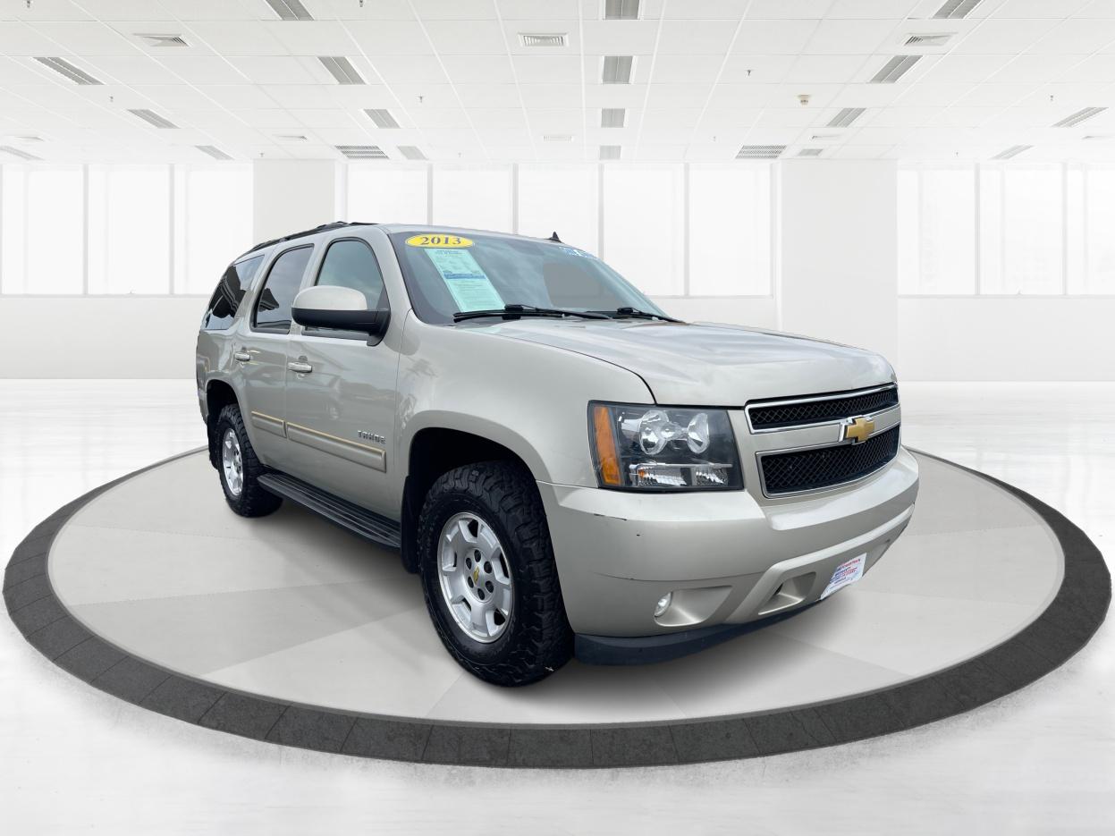 2013 Champagne Silver Metallic Chevrolet Tahoe LT 4WD (1GNSKBE03DR) with an 5.3L V8 OHV 16V FFV engine, 6-Speed Automatic transmission, located at 401 Woodman Dr, Riverside, OH, 45431, (937) 908-9800, 39.760899, -84.123421 - Photo #0