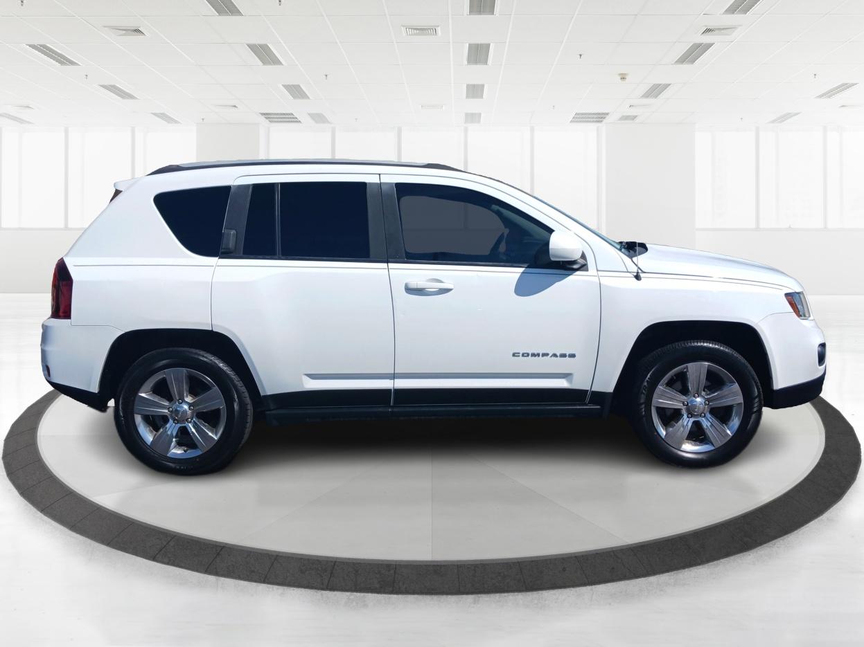 2015 Bright White Clear Coat Jeep Compass Latitude 4WD (1C4NJDEB5FD) with an 2.4L L4 DOHC 16V engine, 6-Speed Automatic transmission, located at 1230 East Main St, Xenia, OH, 45385, (937) 908-9800, 39.688026, -83.910172 - Photo #1