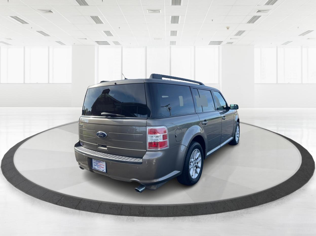 2014 Ginger Ale Metallic Ford Flex SE FWD (2FMGK5B8XEB) with an 3.5L V6 DOHC 24V engine, 6-Speed Automatic Overdrive transmission, located at 4508 South Dixie Dr, Moraine, OH, 45439, (937) 908-9800, 39.689976, -84.218452 - Photo #2