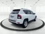 2014 Bright White Clearcoat Jeep Compass Sport FWD (1C4NJCBA9ED) with an 2.0L L4 DOHC 16V engine, located at 880 E. National Road, Vandalia, OH, 45377, (937) 908-9800, 39.891918, -84.183594 - 2014 Jeep Compass Sport FWD - Photo#2