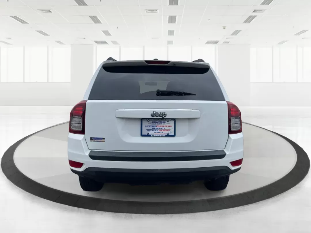 2014 Bright White Clearcoat Jeep Compass Sport FWD (1C4NJCBA9ED) with an 2.0L L4 DOHC 16V engine, located at 880 E. National Road, Vandalia, OH, 45377, (937) 908-9800, 39.891918, -84.183594 - 2014 Jeep Compass Sport FWD - Photo#3