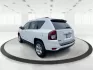 2014 Bright White Clearcoat Jeep Compass Sport FWD (1C4NJCBA9ED) with an 2.0L L4 DOHC 16V engine, located at 880 E. National Road, Vandalia, OH, 45377, (937) 908-9800, 39.891918, -84.183594 - 2014 Jeep Compass Sport FWD - Photo#4