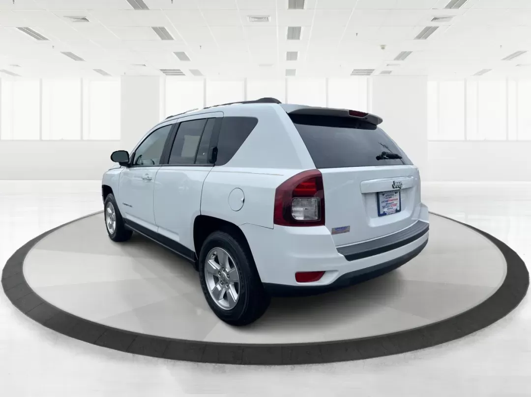 2014 Bright White Clearcoat Jeep Compass Sport FWD (1C4NJCBA9ED) with an 2.0L L4 DOHC 16V engine, located at 880 E. National Road, Vandalia, OH, 45377, (937) 908-9800, 39.891918, -84.183594 - 2014 Jeep Compass Sport FWD - Photo#4